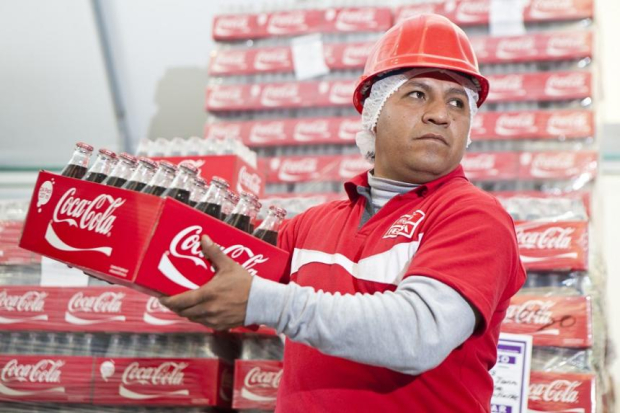 Trabajadores de Coca Cola.