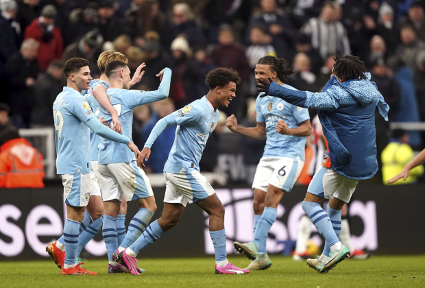 Futbolistas del Manchester City celebran un gol en uno de sus partidos de la Premier League.