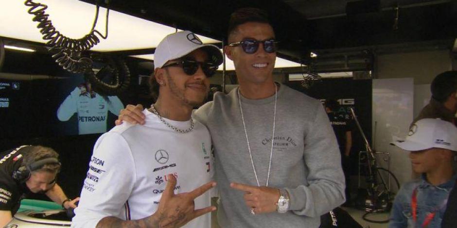 Lewis Hamilton y Cristiano Ronaldo después de una carrera de Fórmula 1.