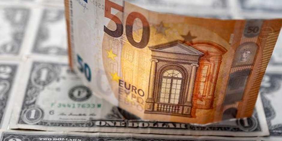 Euro cae a mínimo de 20 años, se aproxima a la paridad con el dólar