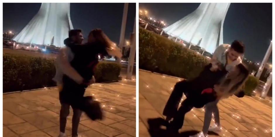 Astiyazh Haghighi, de 21 años, y su prometido Amir Mohammad Ahmadi, de 22, se muestran abrazados y bailando frente a la Torre Azada en la plaza de la libertad en la capital del Irán.