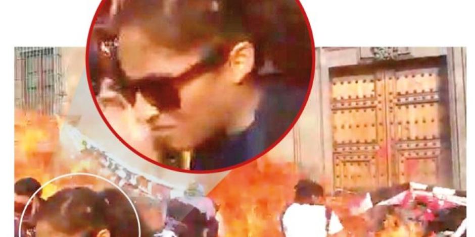FGJ busca a mujer que lanzó bomba molotov en Palacio Nacional