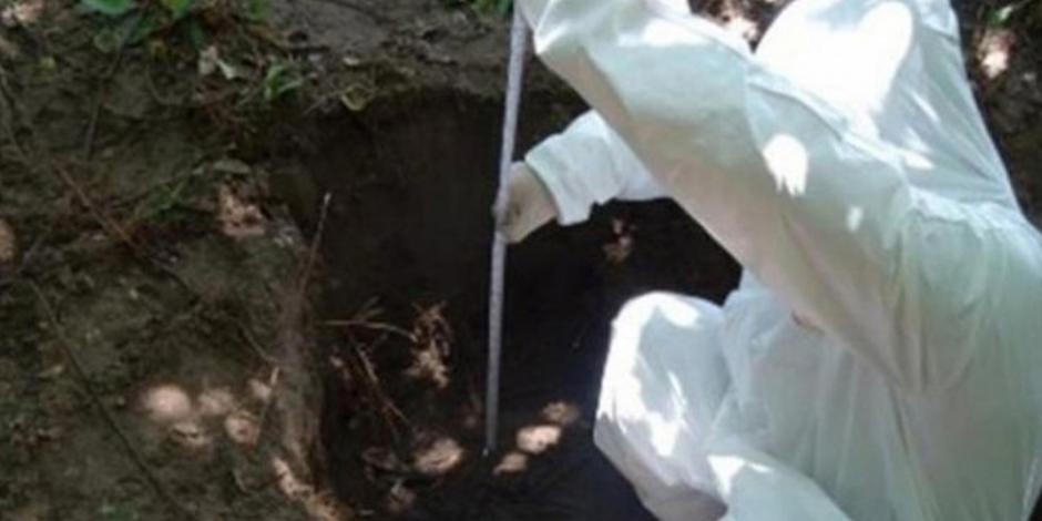 Localizan 25 cuerpos en fosa hallada en Jalisco