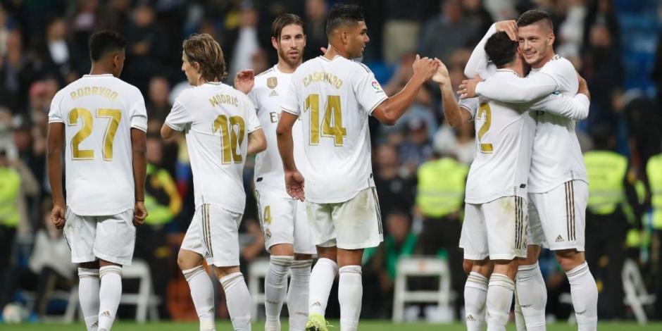 Jugadores del Real Madrid festejan un gol en la actual campaña.