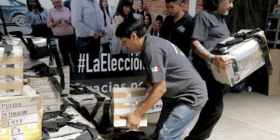 Llegan votos de Puebla para recuento electoral