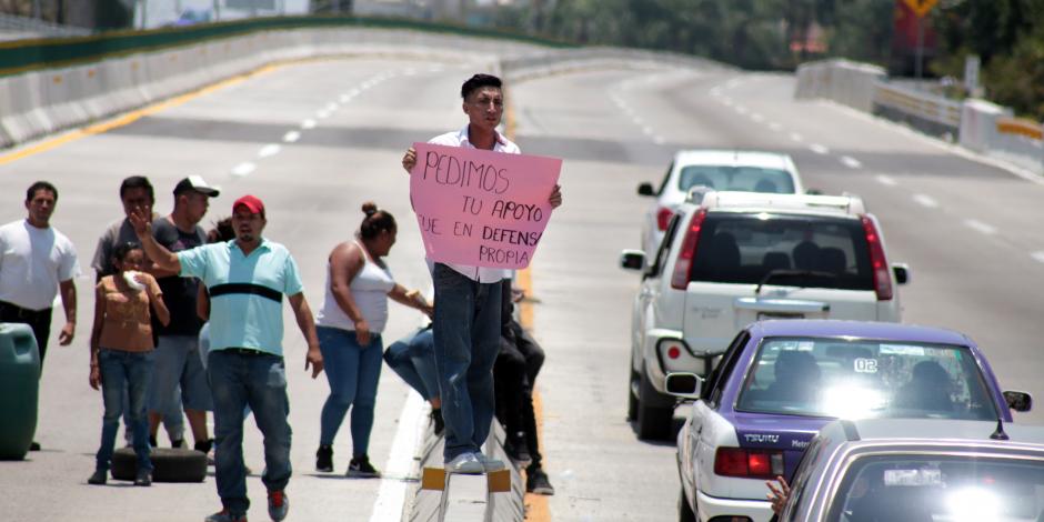 Pobladores bloquean tramo de Paso Exprés en protesta por detención