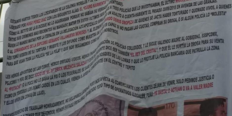 Con una manta denuncian extorsiones comerciantes de la Morelos