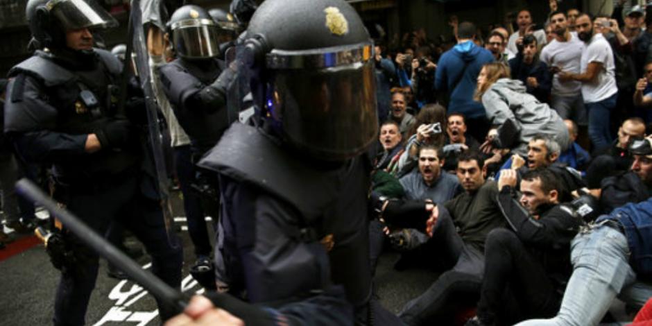 FOTOS: Represión a votantes en referéndum de Cataluña