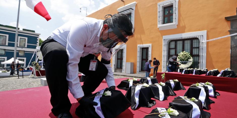 Llegada de cenizas de connacionales a Puebla, en julio pasado.