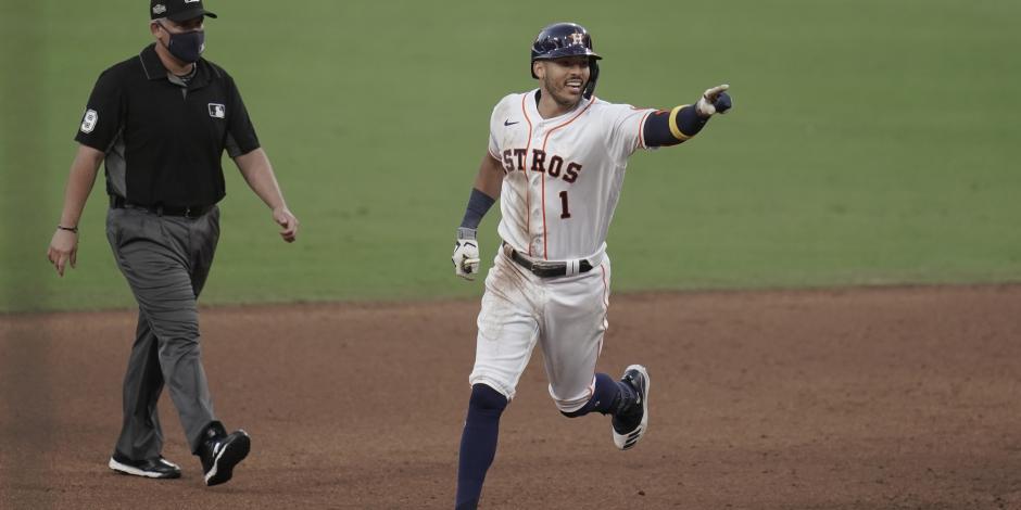 Carlos Correa’s celebra el home run con el que los Astros derrotaron a los Rays en el Juego 5 de la Serie de Campeonato de la Liga Americana de la MLB.