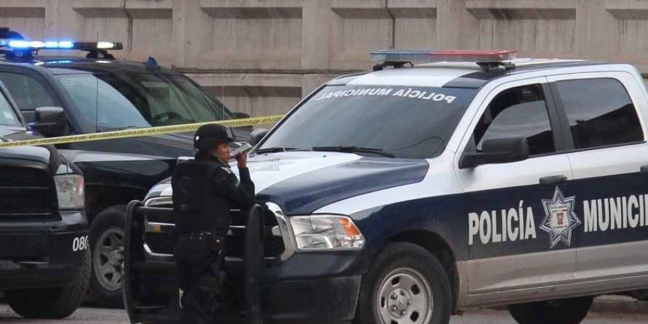 Elementos de la Policía resguardan una escena del crimen en la capital de Guanajuato.