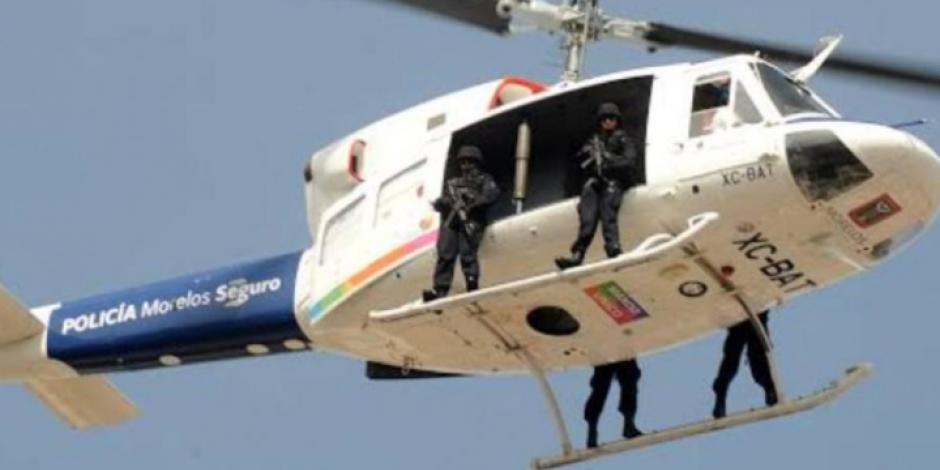Helicóptero de la Comisión Estatal de Seguridad durante un recorrido aéreo.