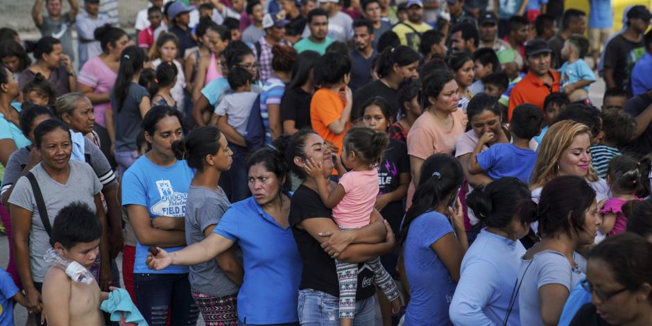 Migrantes, muchos de ellos devueltos a México por la política migratoria del entonces presidente de EU, Donald Trump.