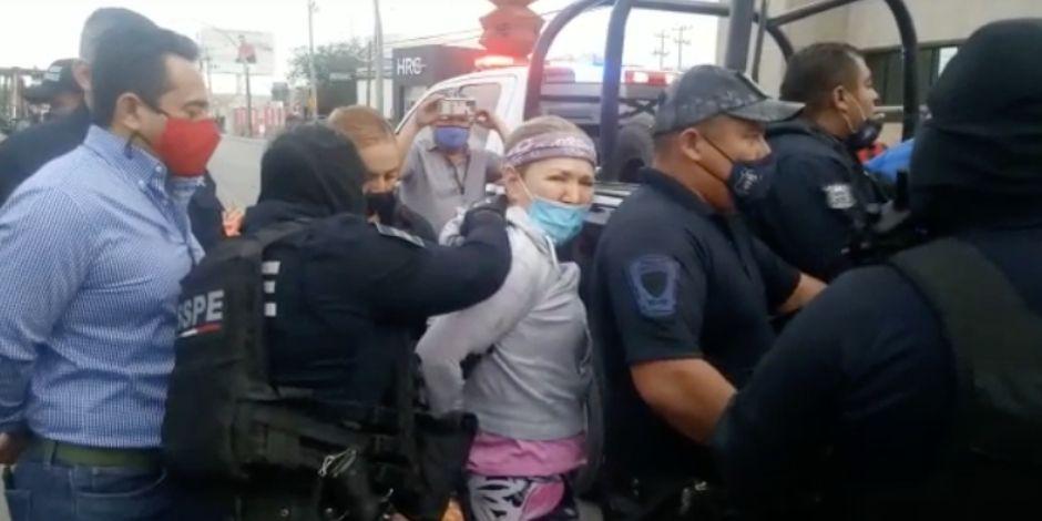 Detención de la candidata priista Adriana Fuente, en Ciudad Juárez.