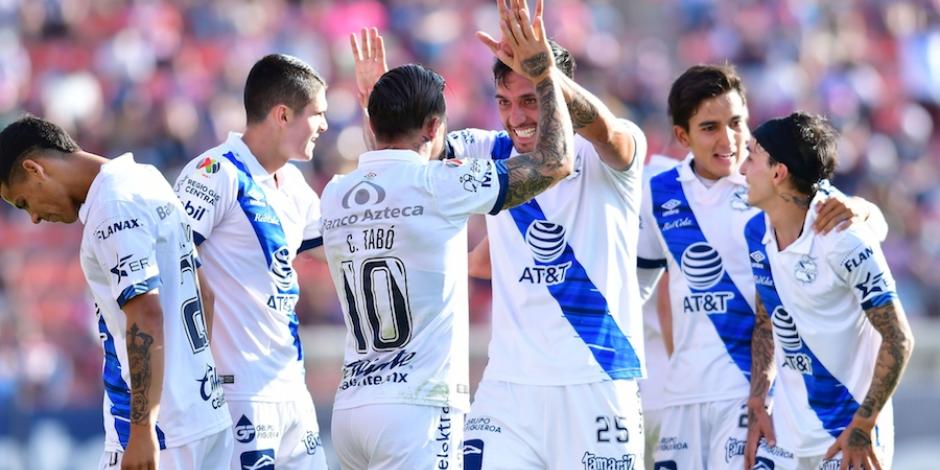 Jugadores del Puebla celebran un gol el fin de semana.