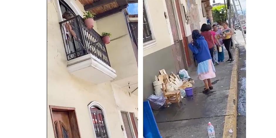 La narración del video señala que la mujer del balcón arrojó agua con la escoba a la persona de la tercera edad que vendía artesanías.