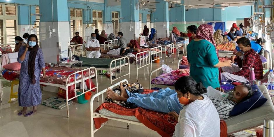 Medios locales informan que la infección viral ha causado un drástico aumento en la ocupación de camas hospitalarias en varios distritos de la India.