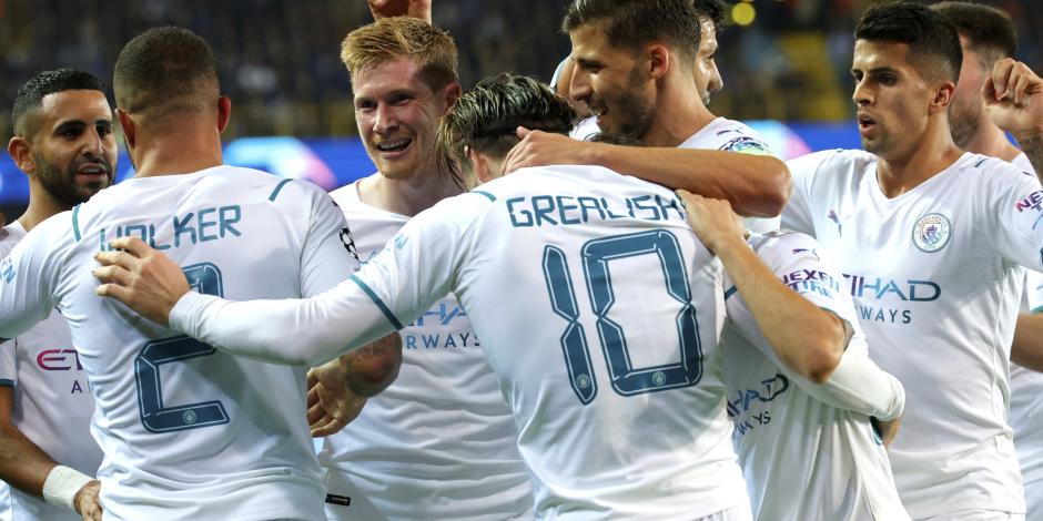 Jugadores del Manchester City celebran un gol ante el Brujas en la Champions League