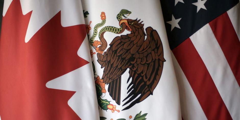 Banderas de Canadá, México y Estados Unidos.