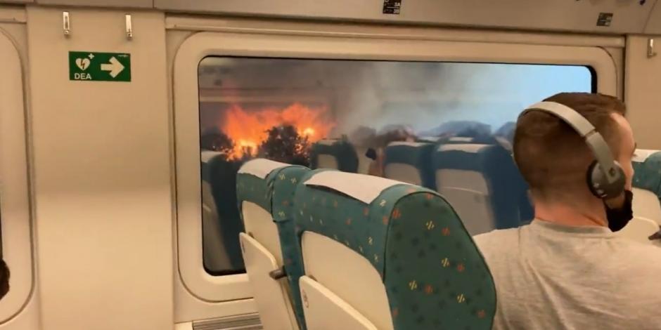 Incendio forestal rodea tren en España; pasajeros viven momentos de pánico (VIDEO).