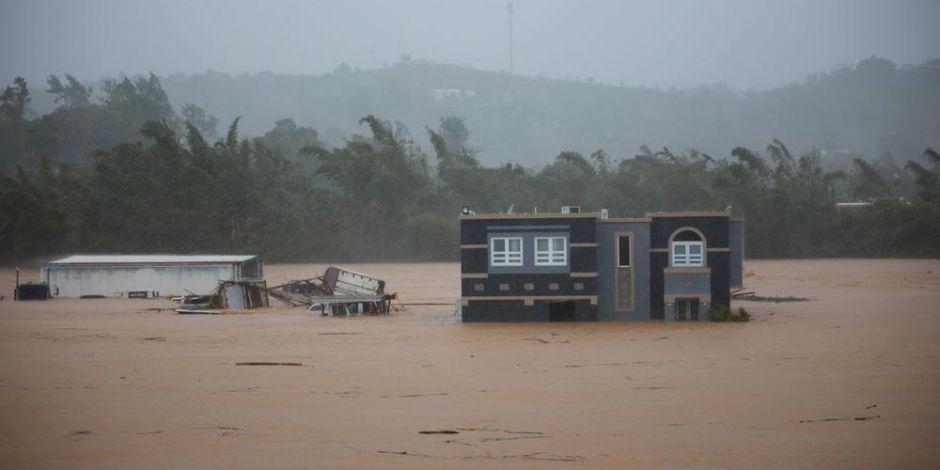 Casa sumergida en las inundaciones causadas por el Huracán "Fiona" en Cayey, Puerto Rico.