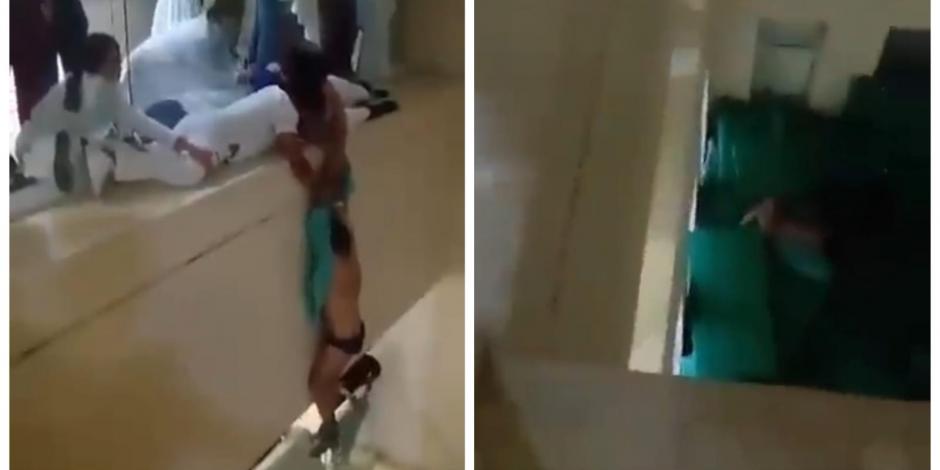 El video, de apenas un minuto de duración, muestras a personal médico sosteniendo de los brazos a un hombre que porta una bata de paciente y que tiene la espalda descubierta.