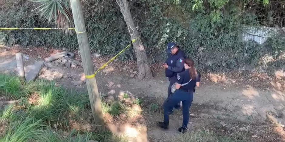 Personal de la Policía Municipal de Cuernavaca acordonó la zona en donde fueron encontrados los restos humanos, ayer.