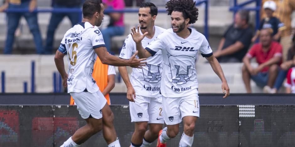 Huerta celebra con Aldrete el segundo gol de ayer en CU.
