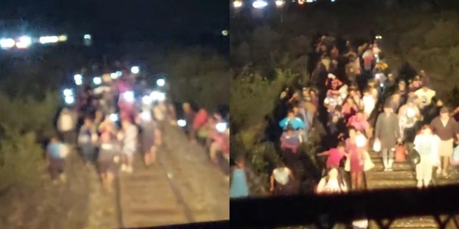 Migrantes detienen el paso del tren "La Bestia" con celulares.