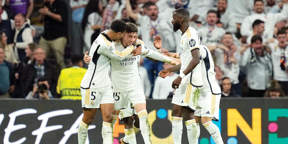 Jugadores del Real Madrid festejan un gol en un partido de la Champions League contra el Manchester City.