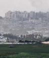 Tanques israelíes maniobran en el interior de la Franja de Gaza, visto desde Israel, 29 de octubre de 2023.