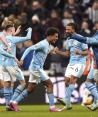 Futbolistas del Manchester City celebran un gol en uno de sus partidos de la Premier League.