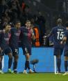 Jugadores del PSG celebran uno de sus goles contra la Real Sociedad en la ida de los octavos de final de la Champions League.