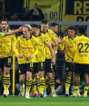 Futbolistas del Borussia Dortmund festejan un gol en la Champions League 2024.