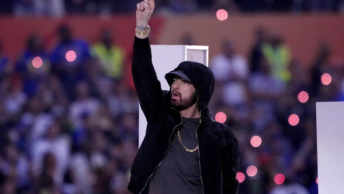 Complex Sneakers on X: .@Eminem debuts a PE version of the “Fire Red” Air Jordan  3. #SuperBowl  / X