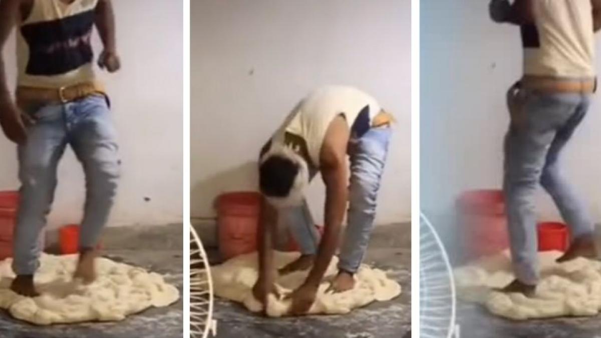 ¡Mmm... una delicia! Captan a vendedor de empanadas preparando masa con sus pies (VIDEO)