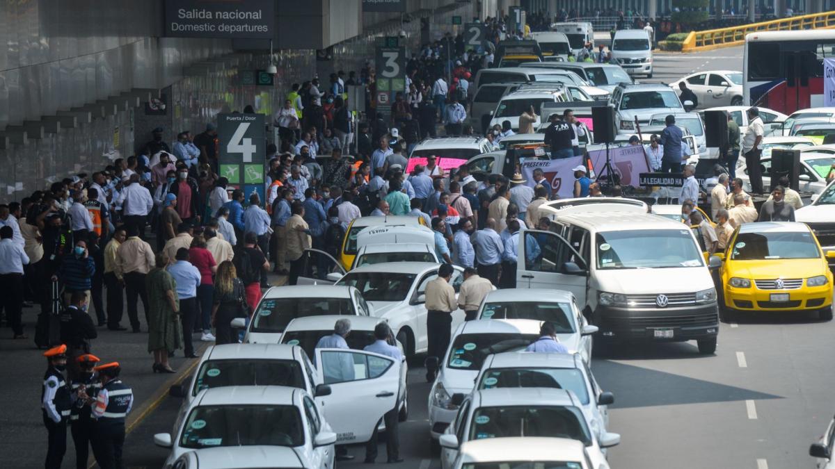 Advierten multas de hasta 43 mil pesos a taxis por aplicación que operen en el AICM