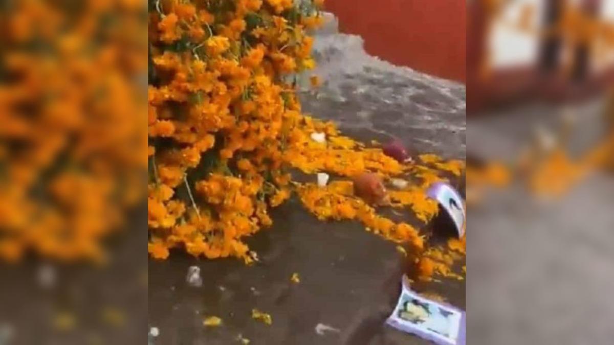 Video: Así fue cómo intensa lluvia arrasó con mega altar de muertos