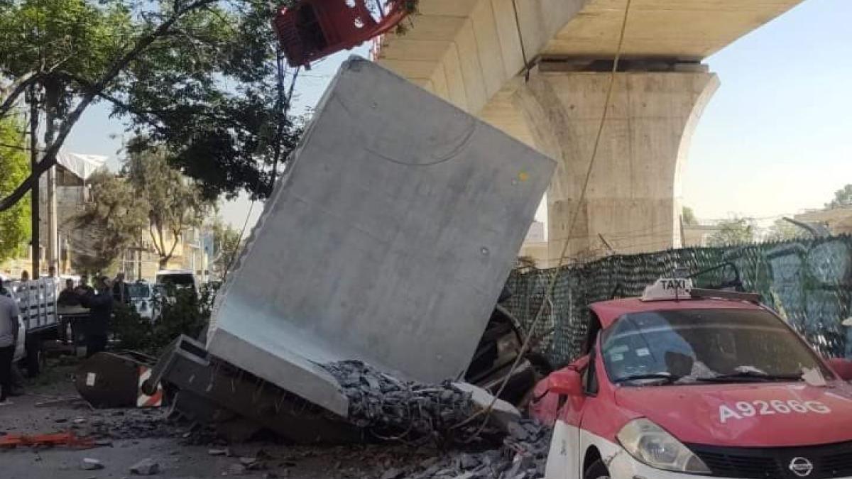 Reportan caída de estructura del Tren Interurbano en Observatorio sobre una camioneta | VIDEO